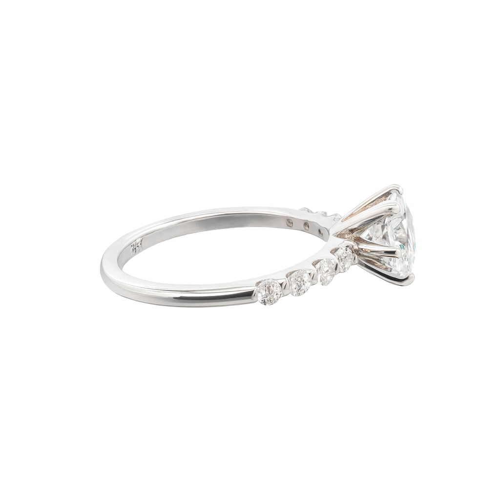 Diamond ring with a bow design on a white background