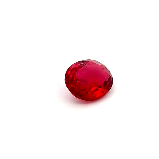 Red gemstone on a white background