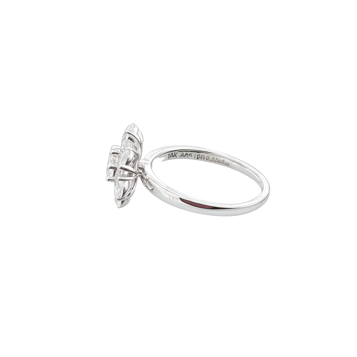 Silver ring with a diamond on a white background