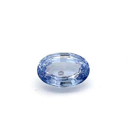 Light Blue 8.65ct oval gemstone on a white background