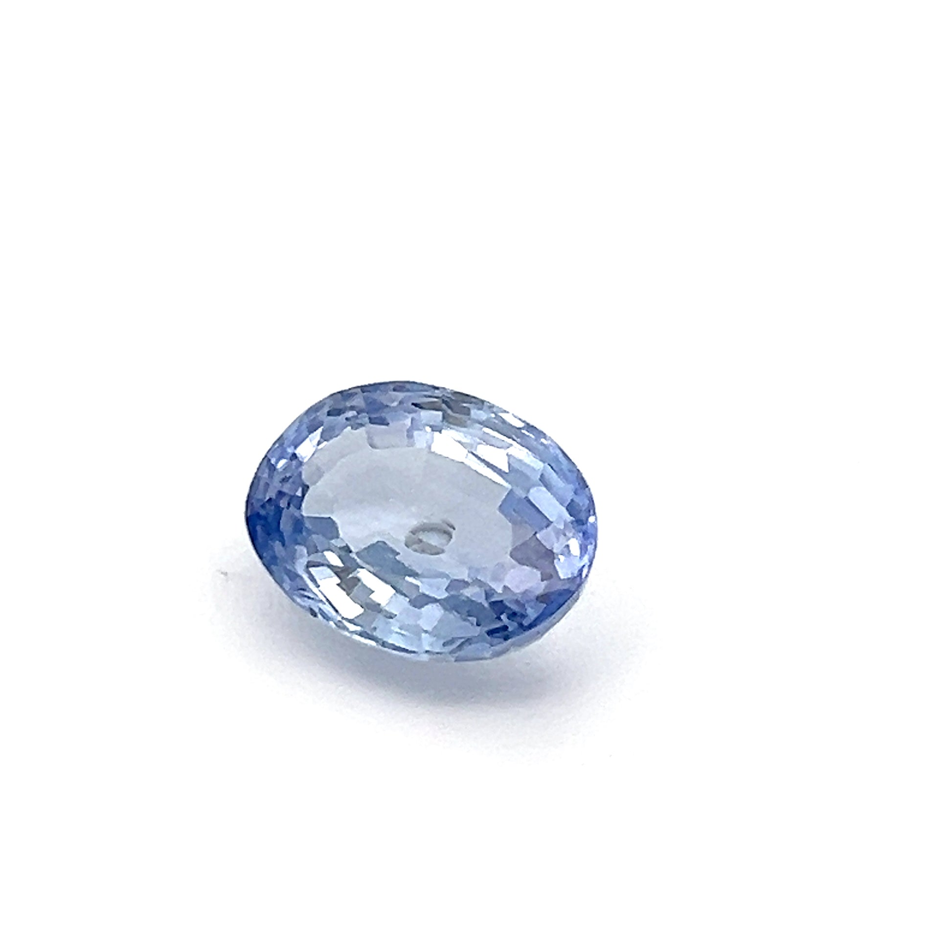 Blue gemstone on a white background