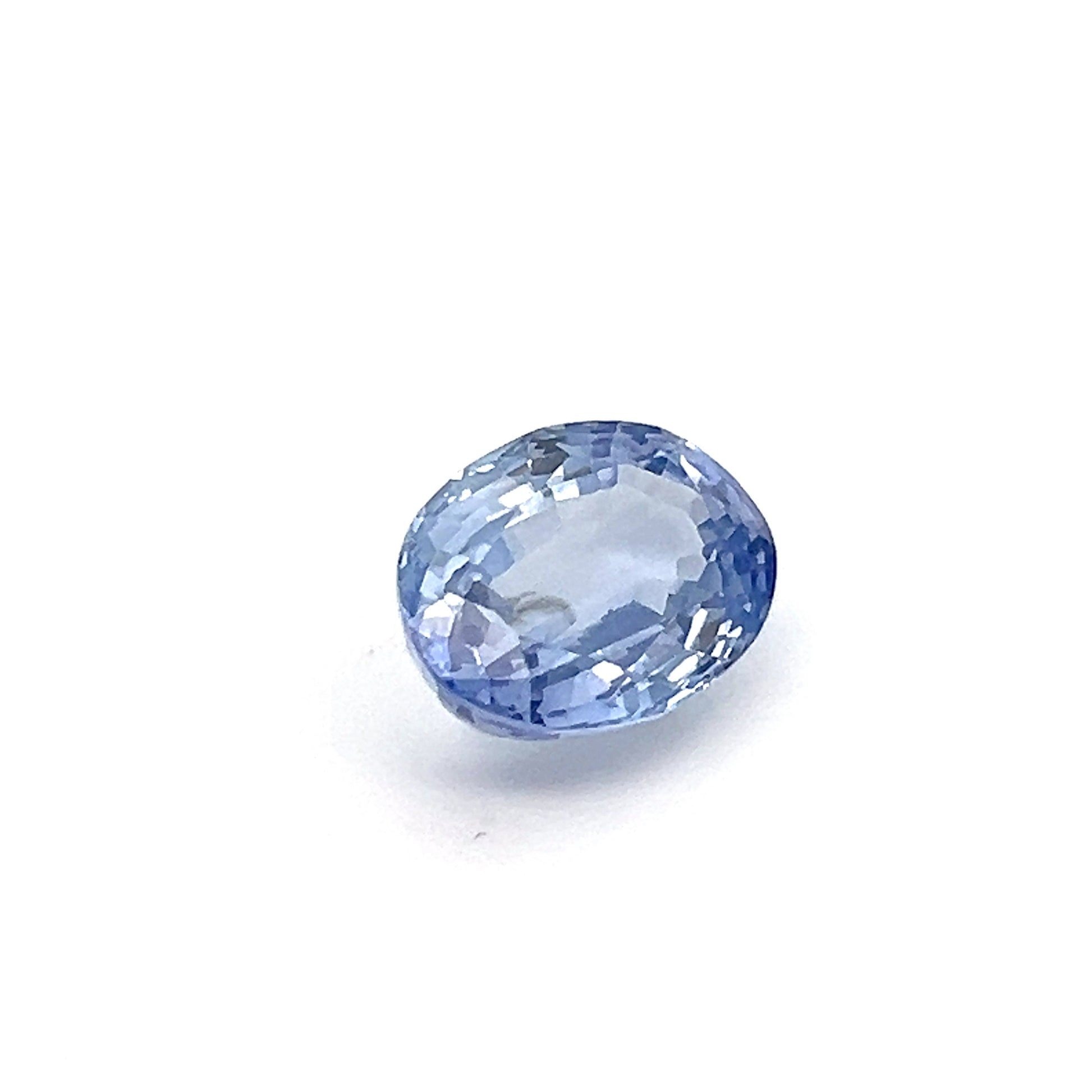 Light blue gemstone on a white background