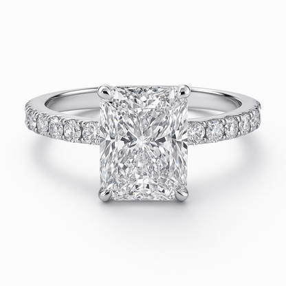 Diamond ring with a emerald-cut center stone on a white background