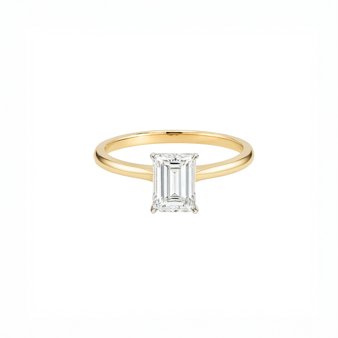 Gold ring with a diamond on a white background
