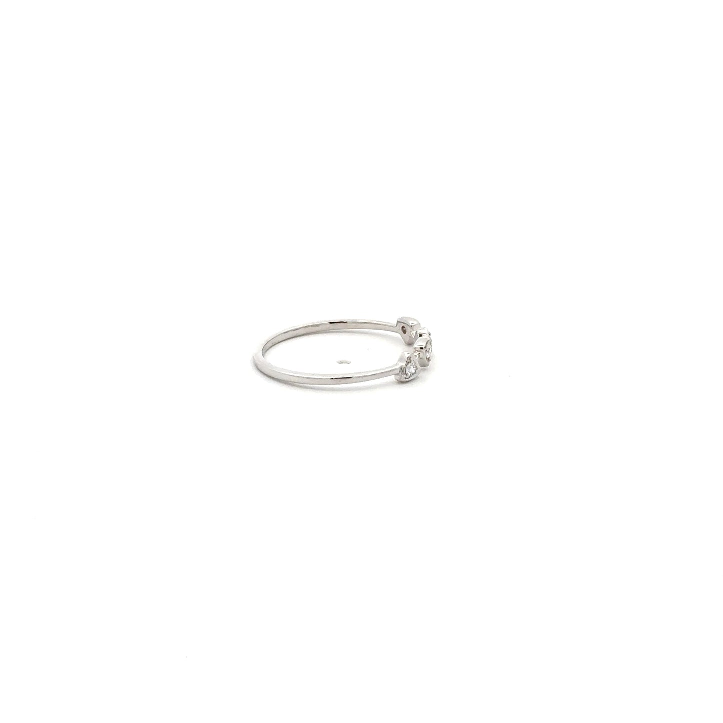 white gold ring with small lab diamonds on a white background