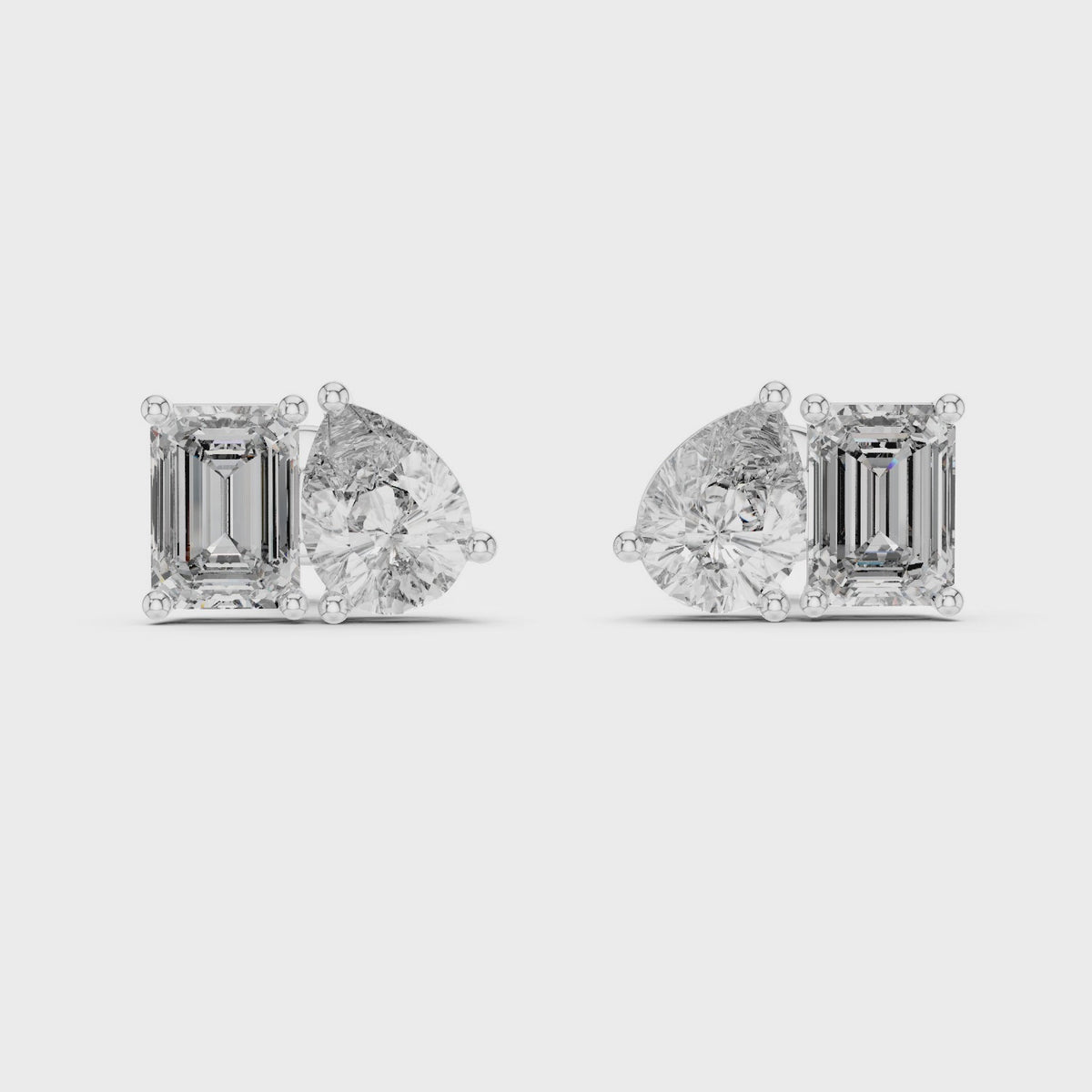 3.60 CT Emerald & Pear Lab Grown Diamond Toi et Moi Stud Earrings, White Gold
