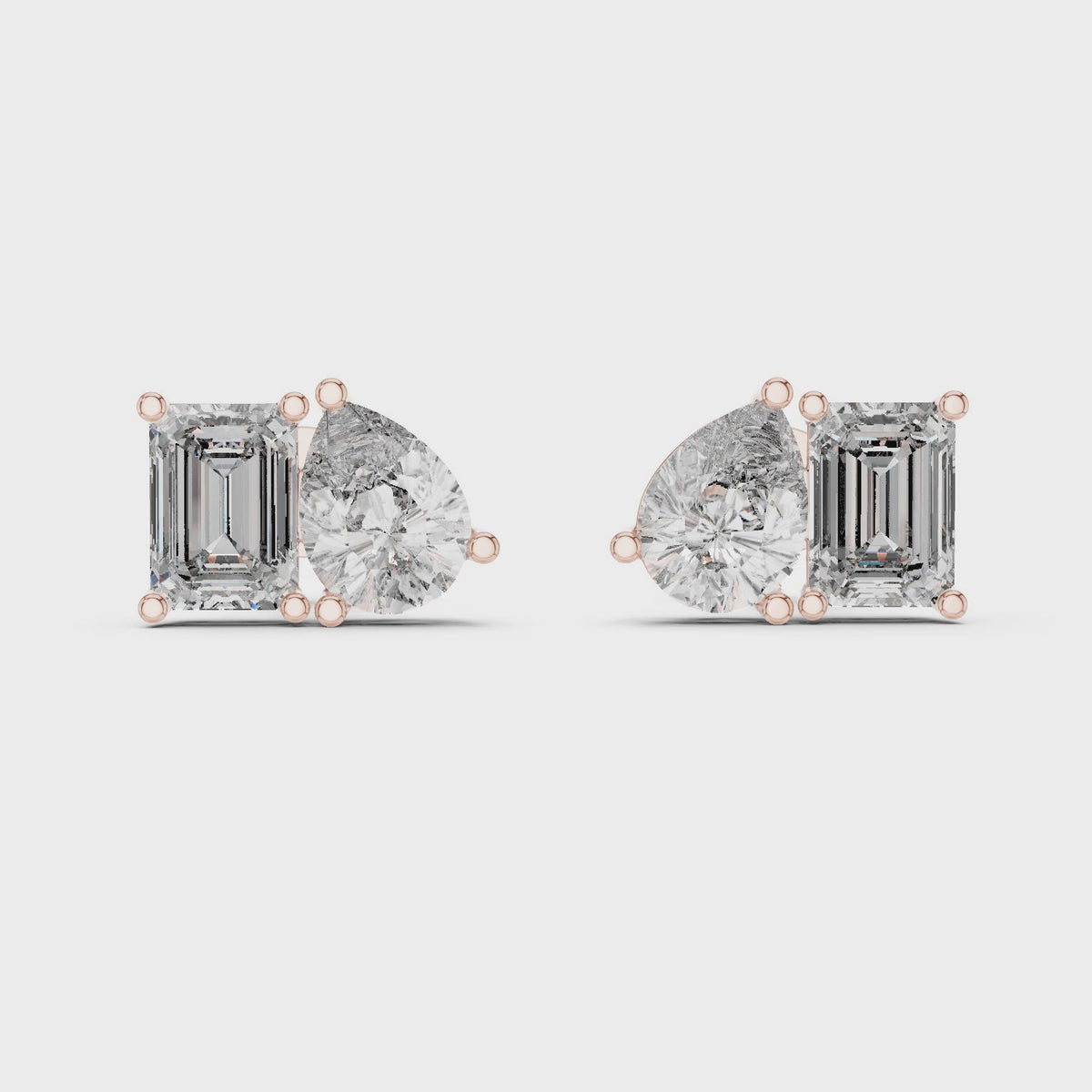 4.00 CT Emerald & Pear Cut Lab Grown Diamond Toi et Moi Stud Earrings, Rose Gold
